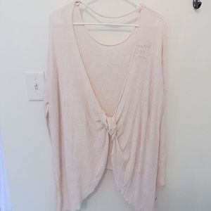 Free people light pink tunic with open back